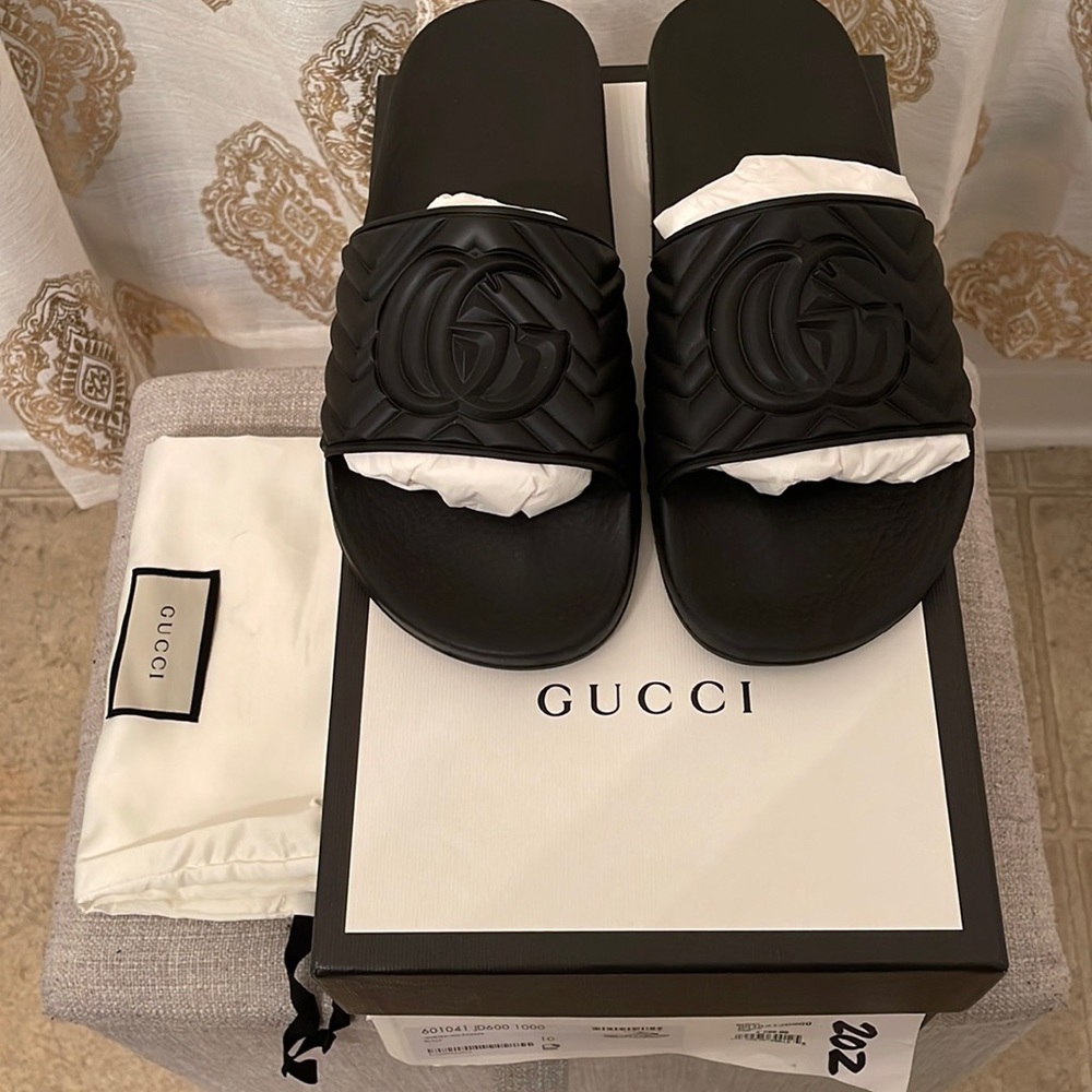 Good evening…. Gucci men slides for $260. Excellent condition ( no scuffs)